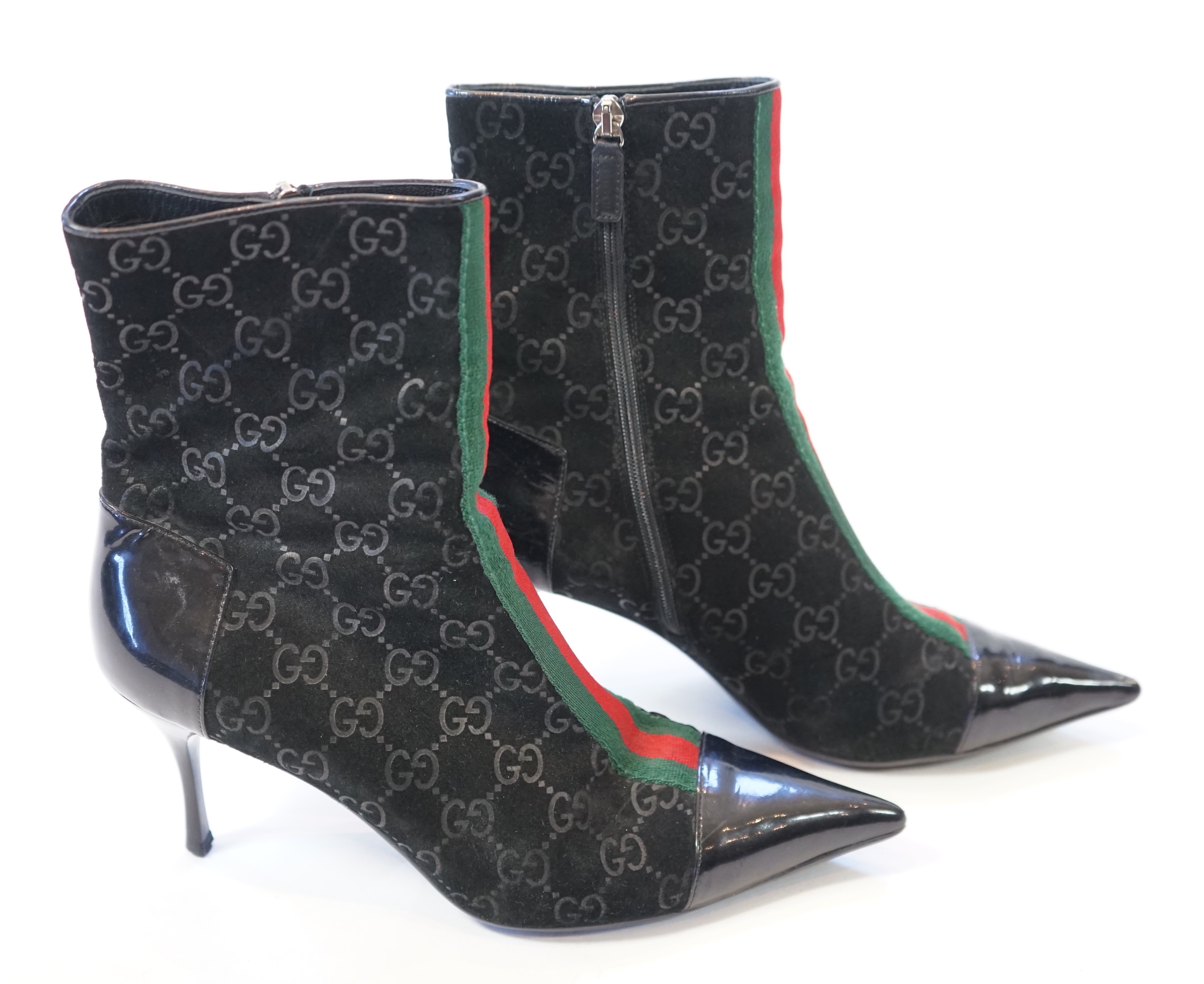 A pair of Gucci monogram pattern and ribbon black lady's suede ankle boots, size EU 38.5